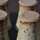 8 stoneware cups/mugs by Gustave Tiffoche