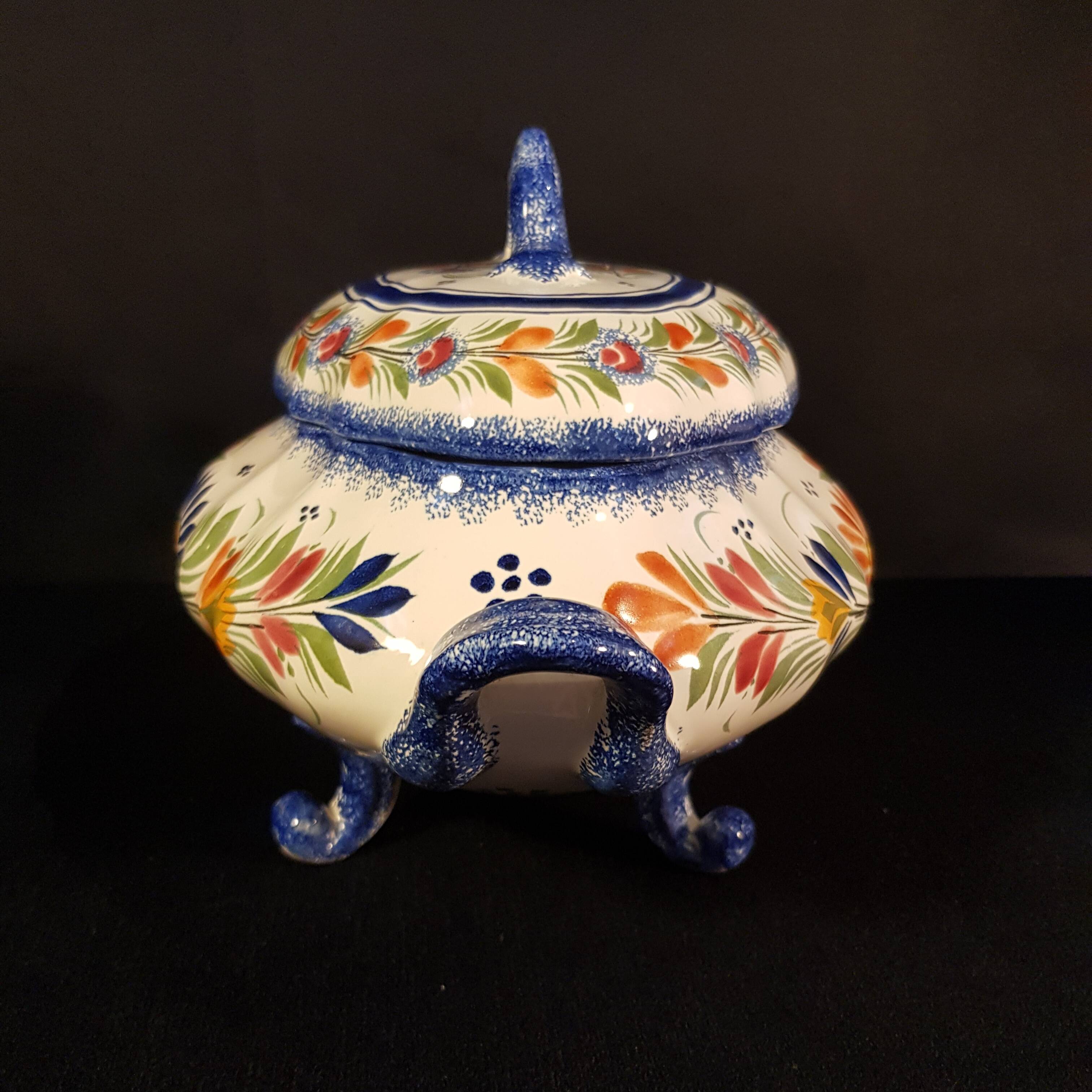 Vegetable soup tureen on Henriot Quimper display dish