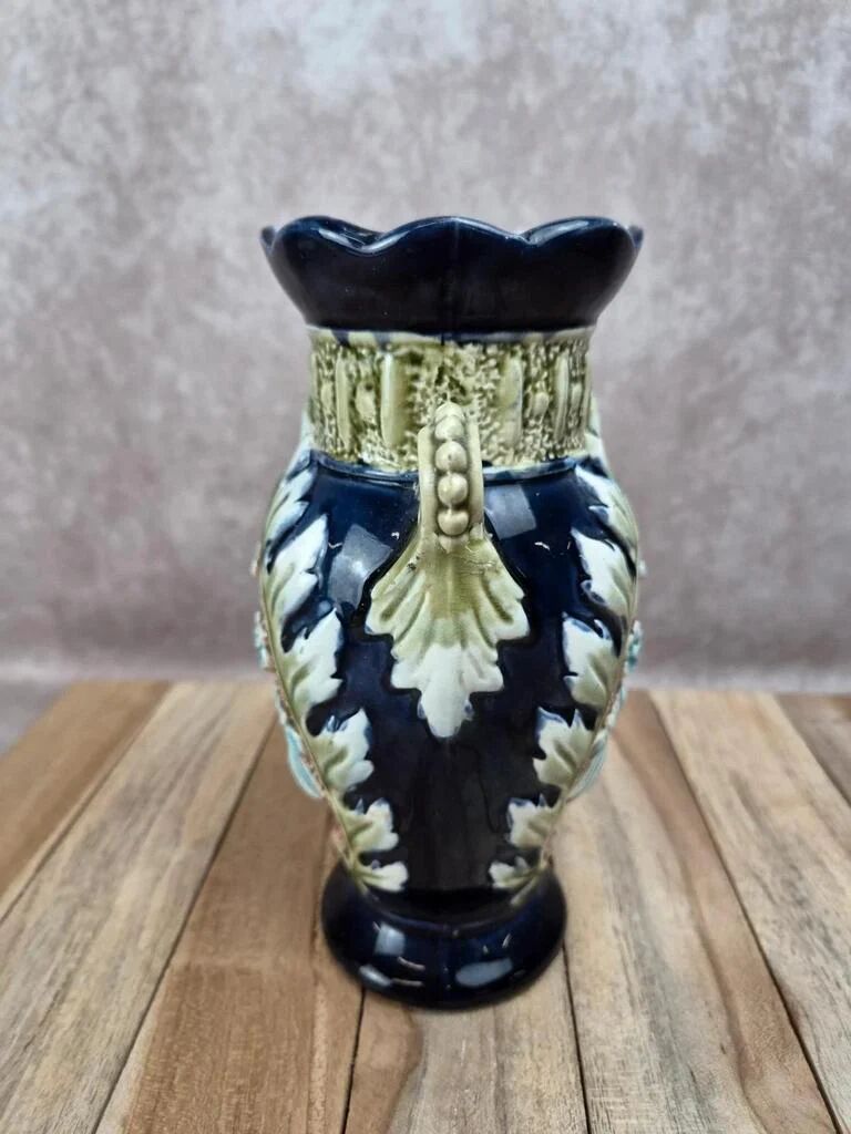 Gustave De Bruyne barbotine vase Fives Lille with an old floral decoration and stylised handles.