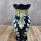 Gustave De Bruyne barbotine vase Fives Lille with an old floral decoration and stylised handles.