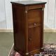Empire bedside table from the 19th century in cherry wood and black marble.