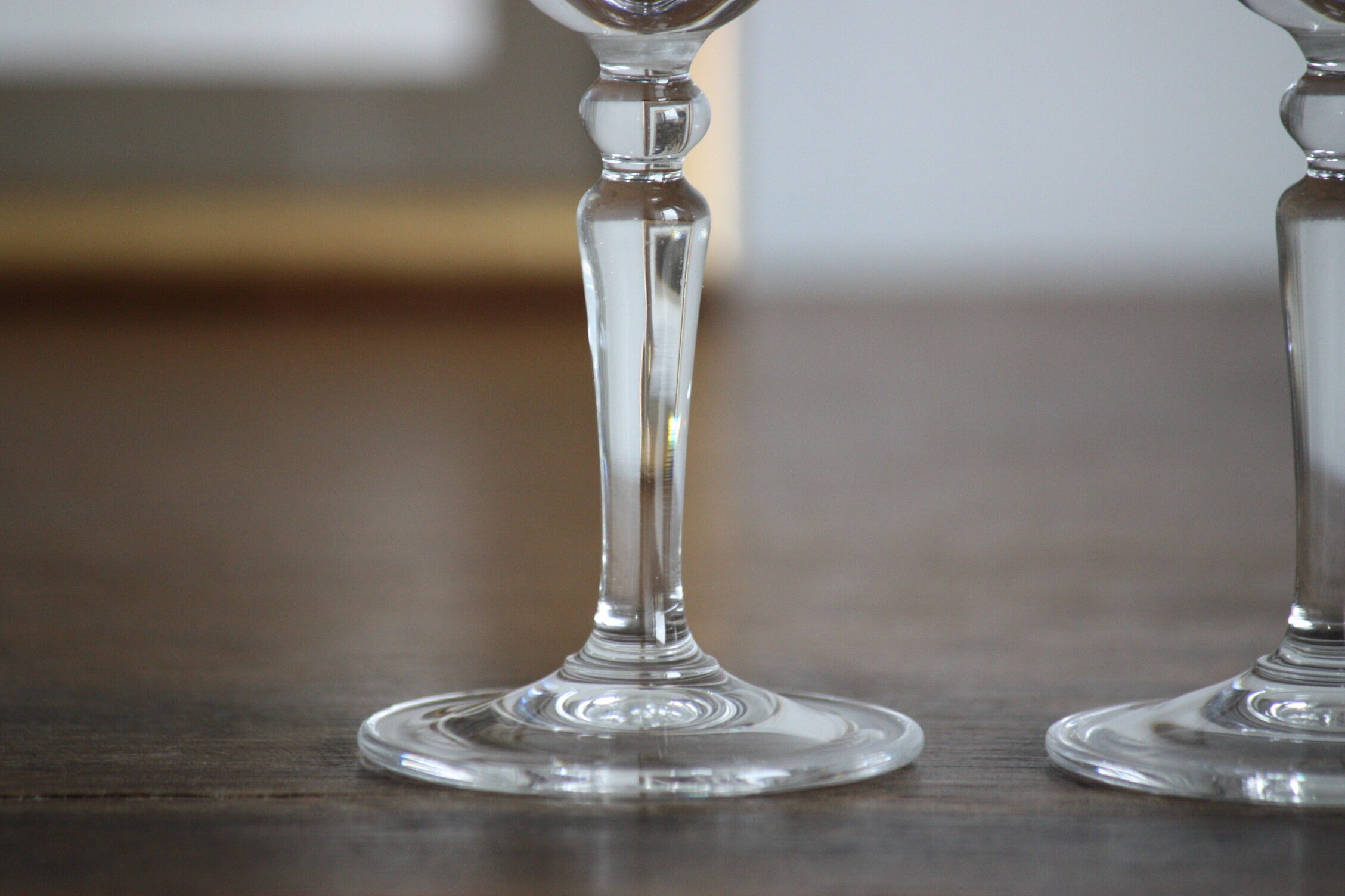 2 crystal champagne flutes of engraved arches