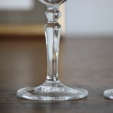 2 crystal champagne flutes of engraved arches