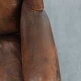 Vintage wingback armchair made of sheepskin leather with beautiful colours