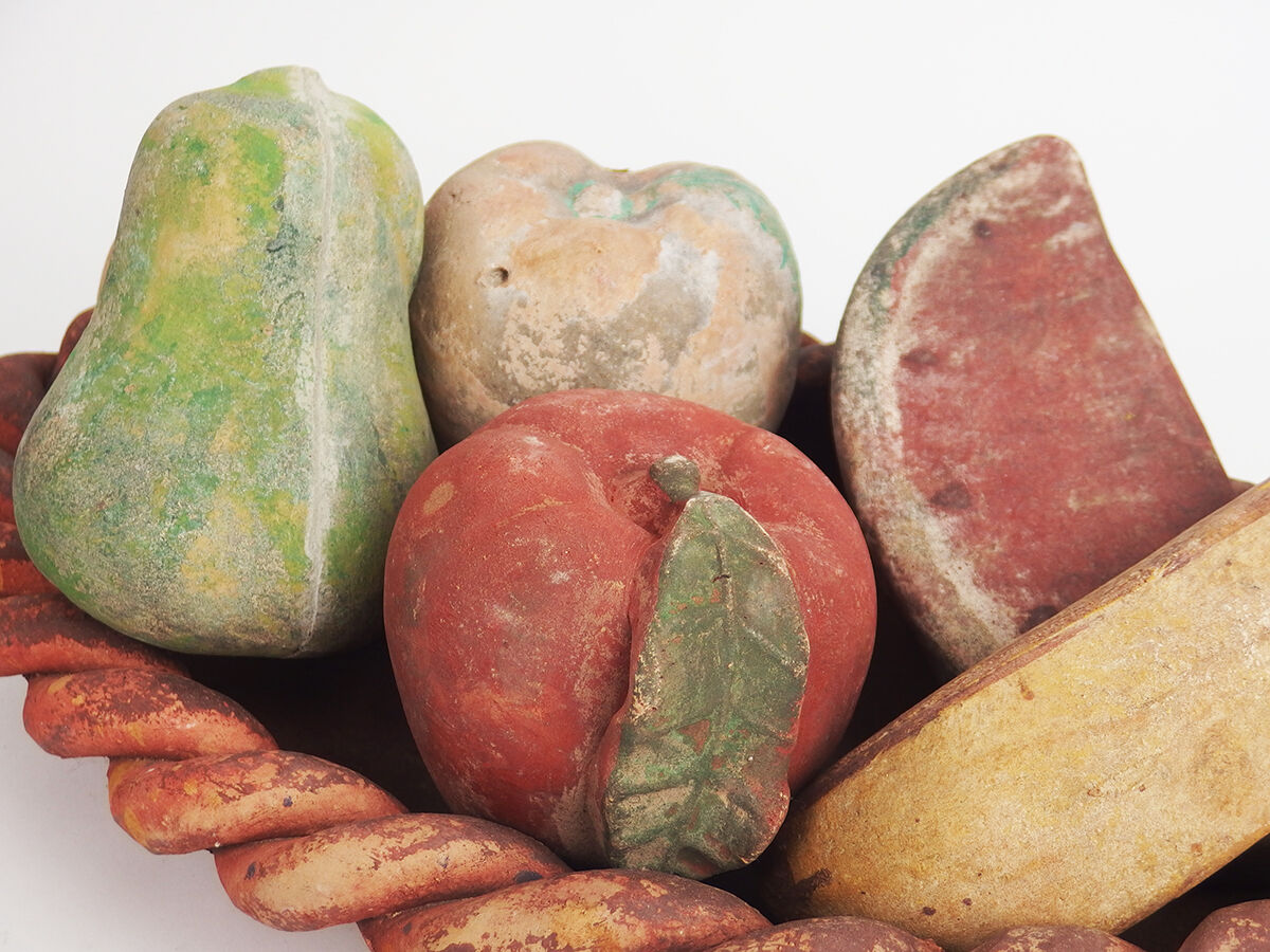 Basket and terracotta fruit