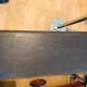 Antique dark wood chest with geometric paneling / pointed detail