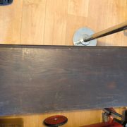 Antique dark wood chest with geometric paneling / pointed