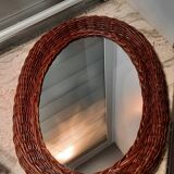 Vintage woven wicker oval mirror