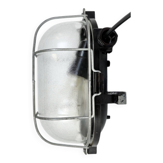 Industrial brown bakelite wall light with frosted glass, 1960s