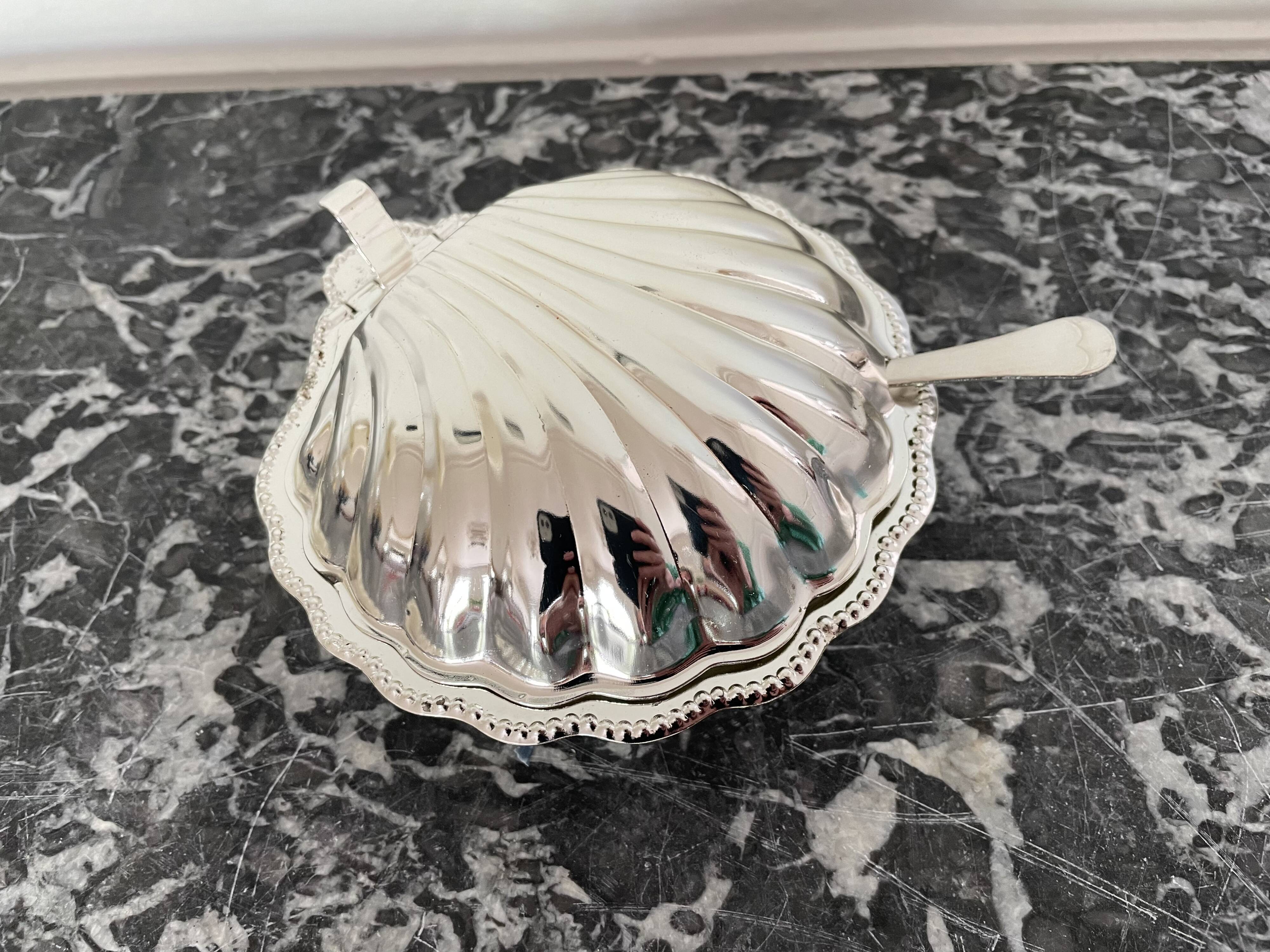 Shell-shaped metal butter dish