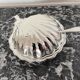 Shell-shaped metal butter dish