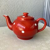 Vintage red teapot with white polka dots