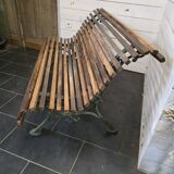 Old cast iron garden bench with oak slats