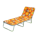 Vintage camp bed with orange flowers