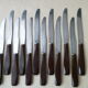 Box of 12 table knives in stainless steel and bakelite EC 144
