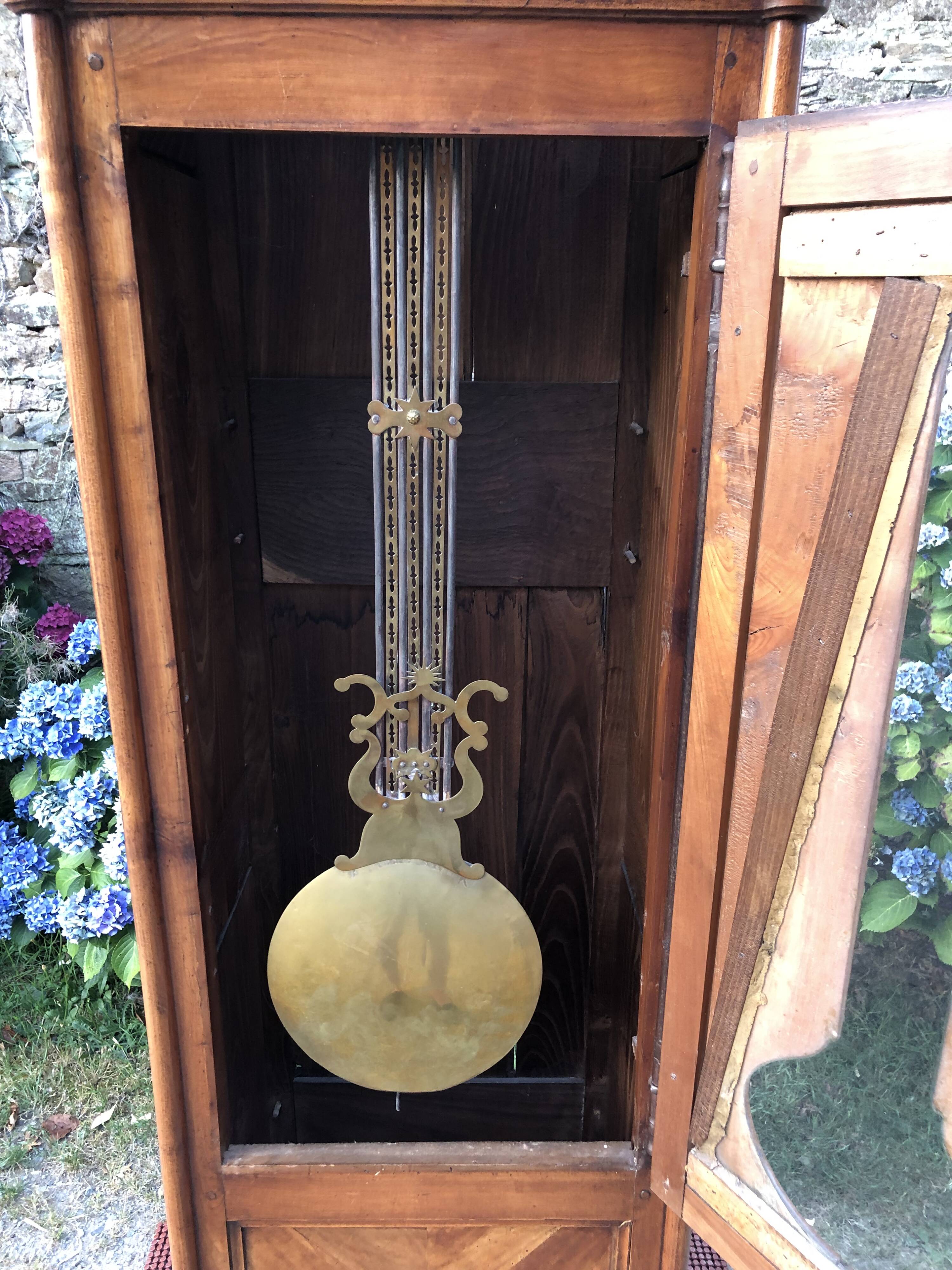 Comtoise clock in cherry style Louis XV period 19th region Fougères.