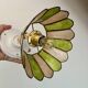 Vintage wall lamp with a green and pink mother-of-pearl lampshade