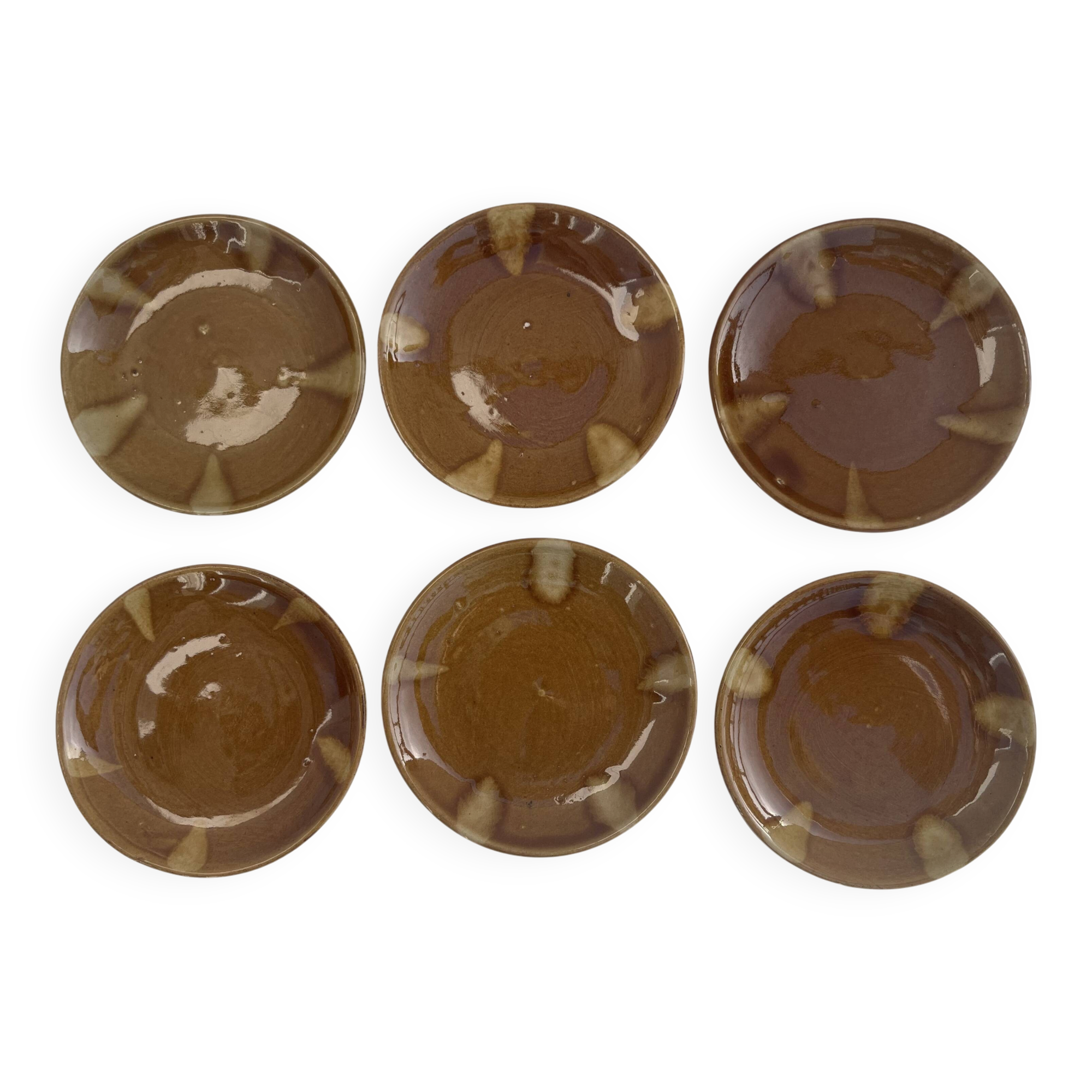 6 small vintage ceramic plates from the 1960s.