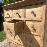 Beautiful piece of furniture with 8 drawers/2 doors in raw wood.