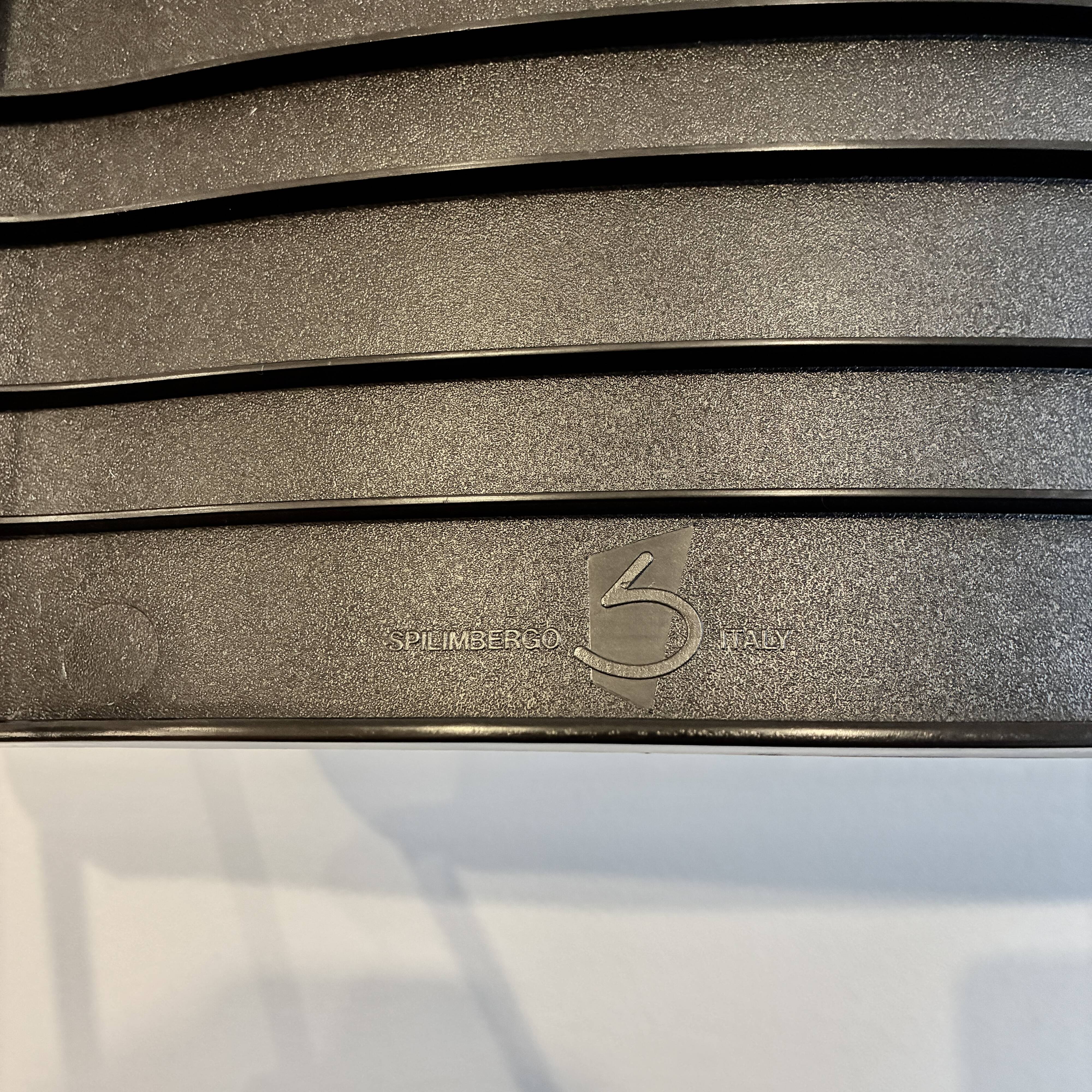 4 Spilimbergo chairs from Italy in chrome steel and black plastic.