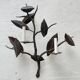 Wall lamp in wrought iron.