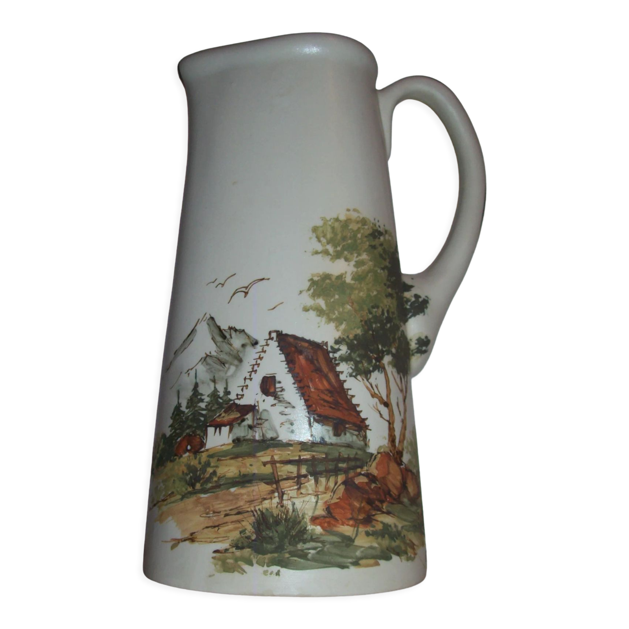 Ceramic pitcher with hand-painted decoration