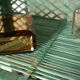 Vintage mint green wicker bookcase