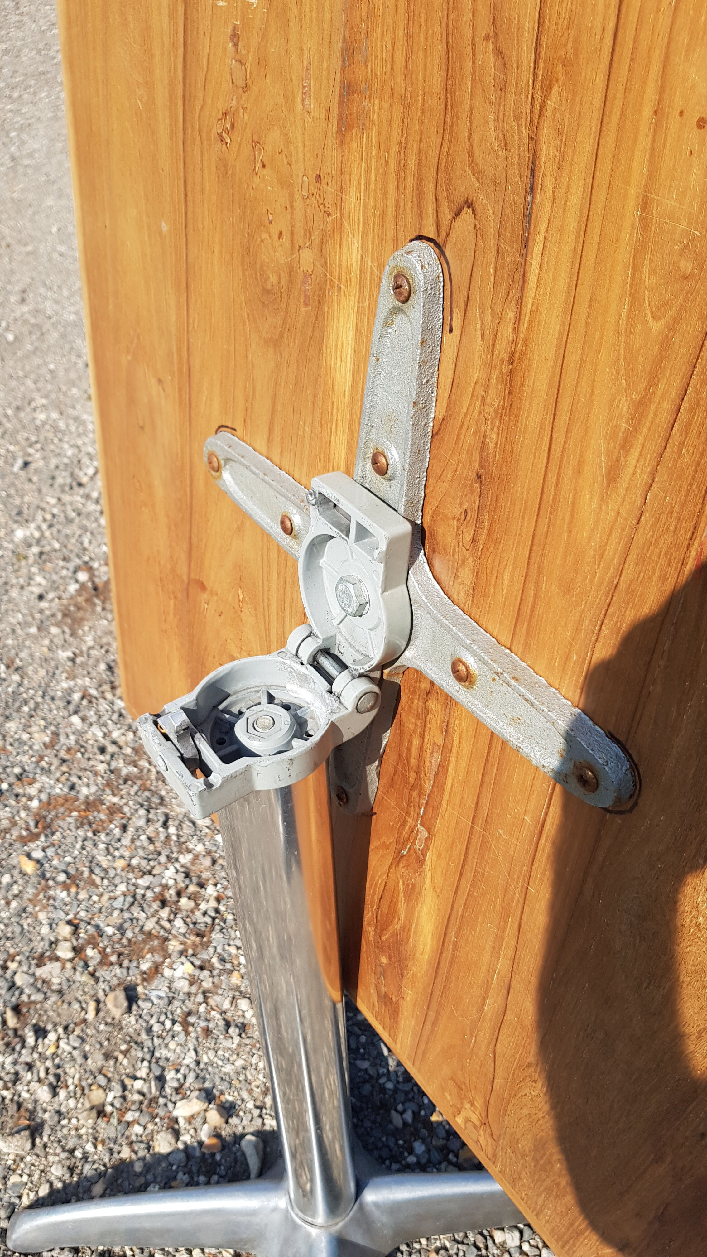 Foldable bistro table with teak top and aluminum base