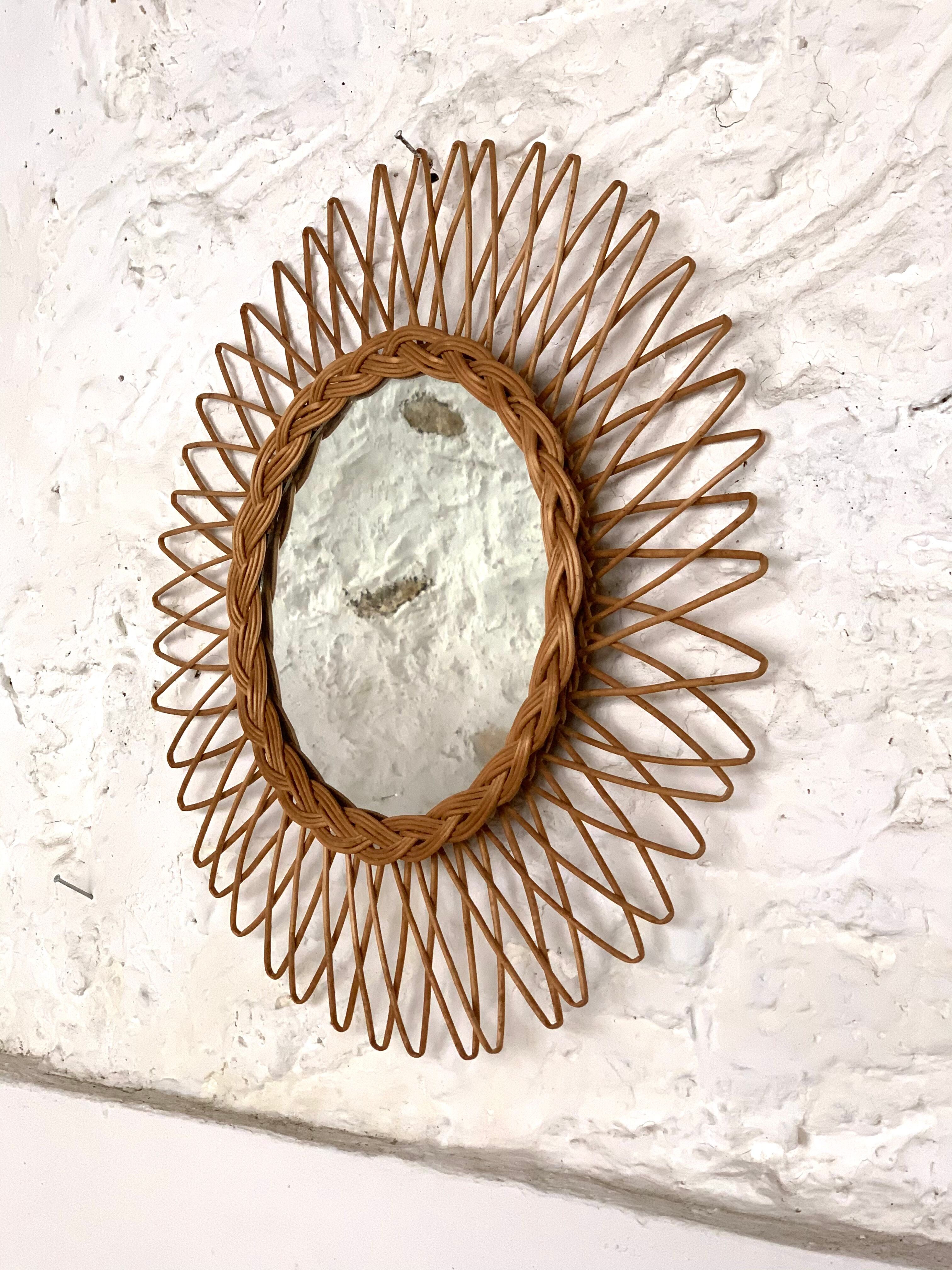 Vintage rattan sun mirror