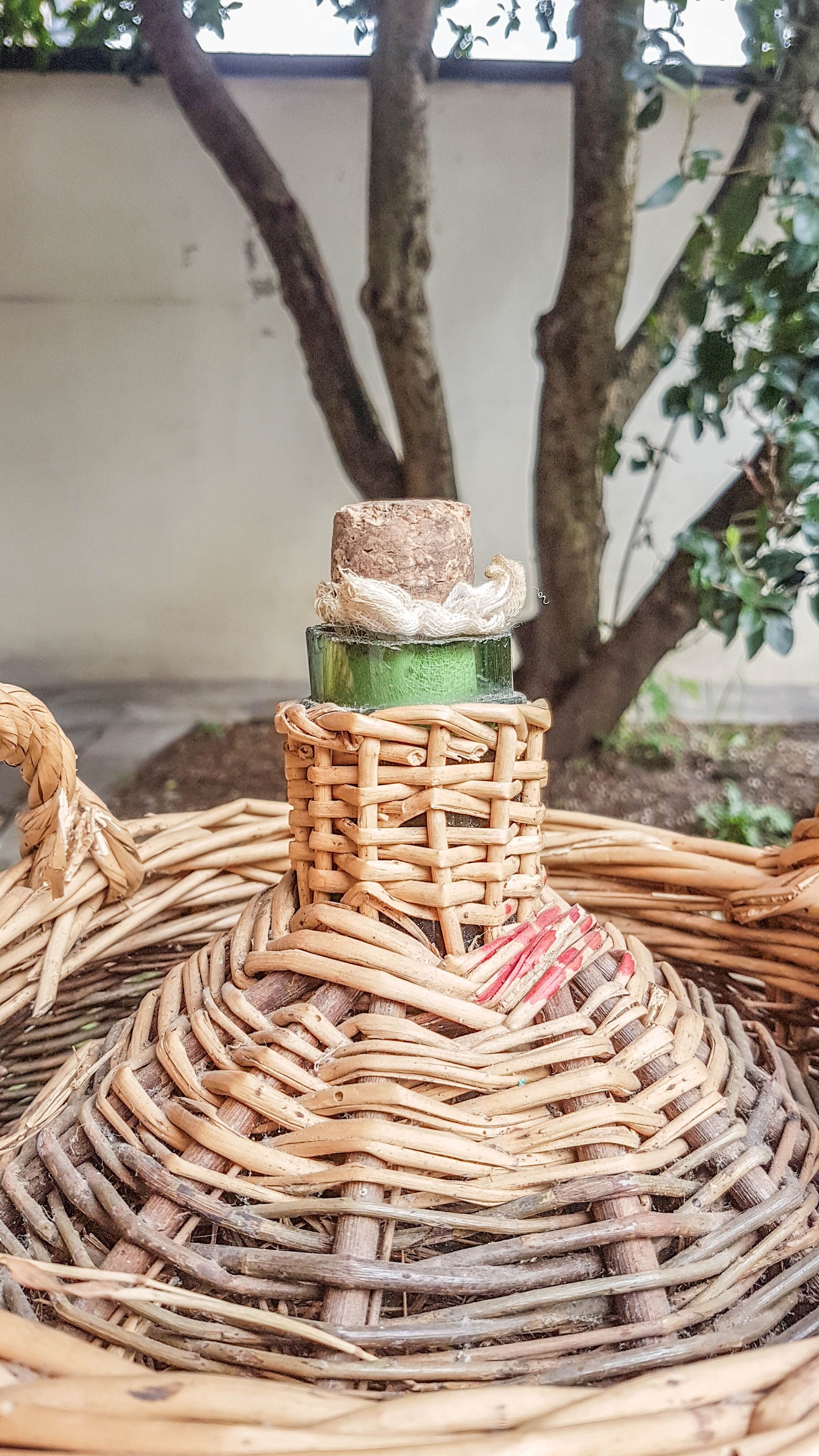 Demijohn covered with wicker