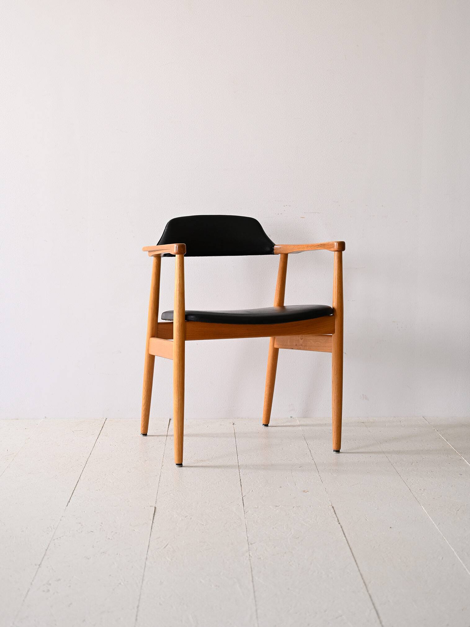 Scandinavian armchair covered in imitation leather