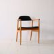 Scandinavian armchair covered in imitation leather