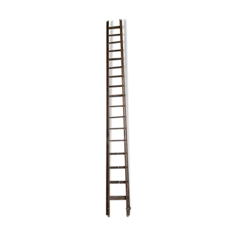 Very large vintage sliding wooden ladder