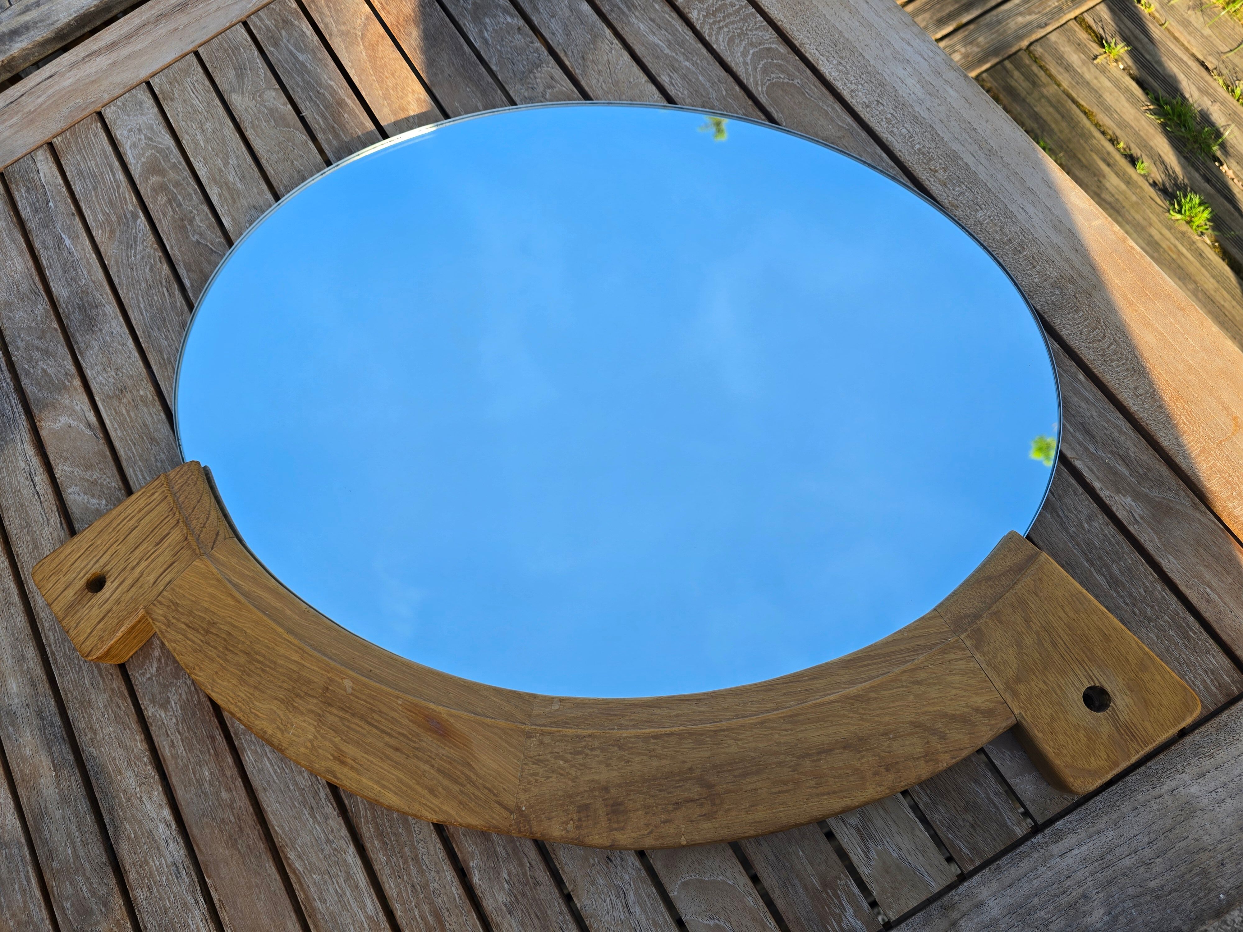 Oval mirror by Guillerme and Chambron