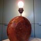 Lamp in elm or thuja wood.