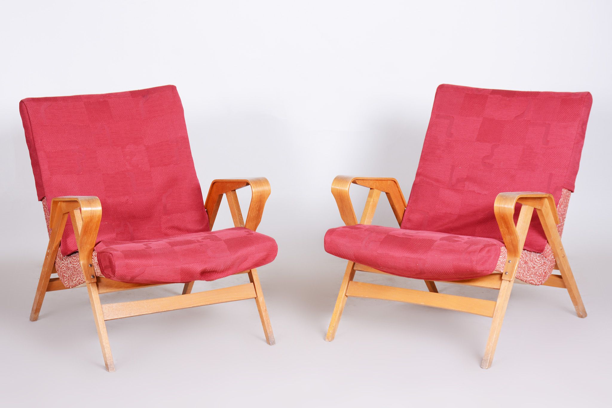 Pair of salmon midcentury armchairs, made by Tatra pravenec, 1950s czechia