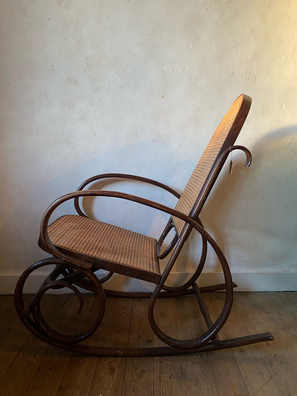 Wood and cane rocking chair