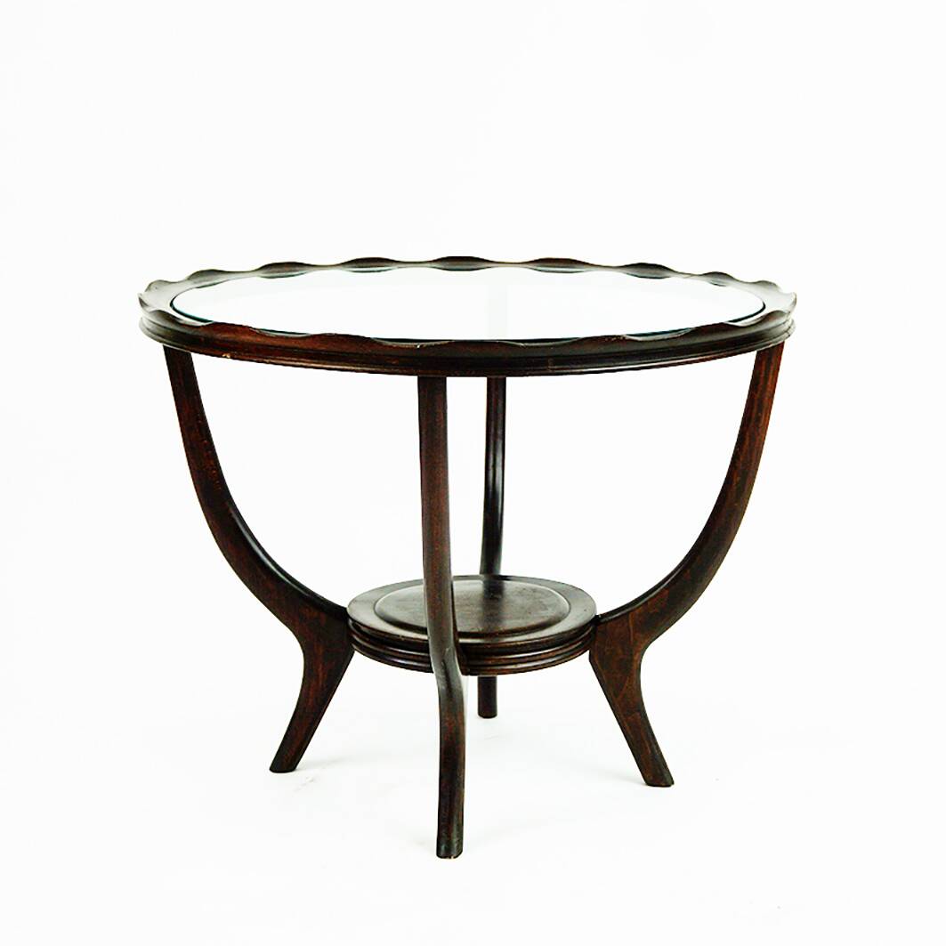 Italian round coffee table from the 1950s with a glass top, attributed to Carlo di Carli.