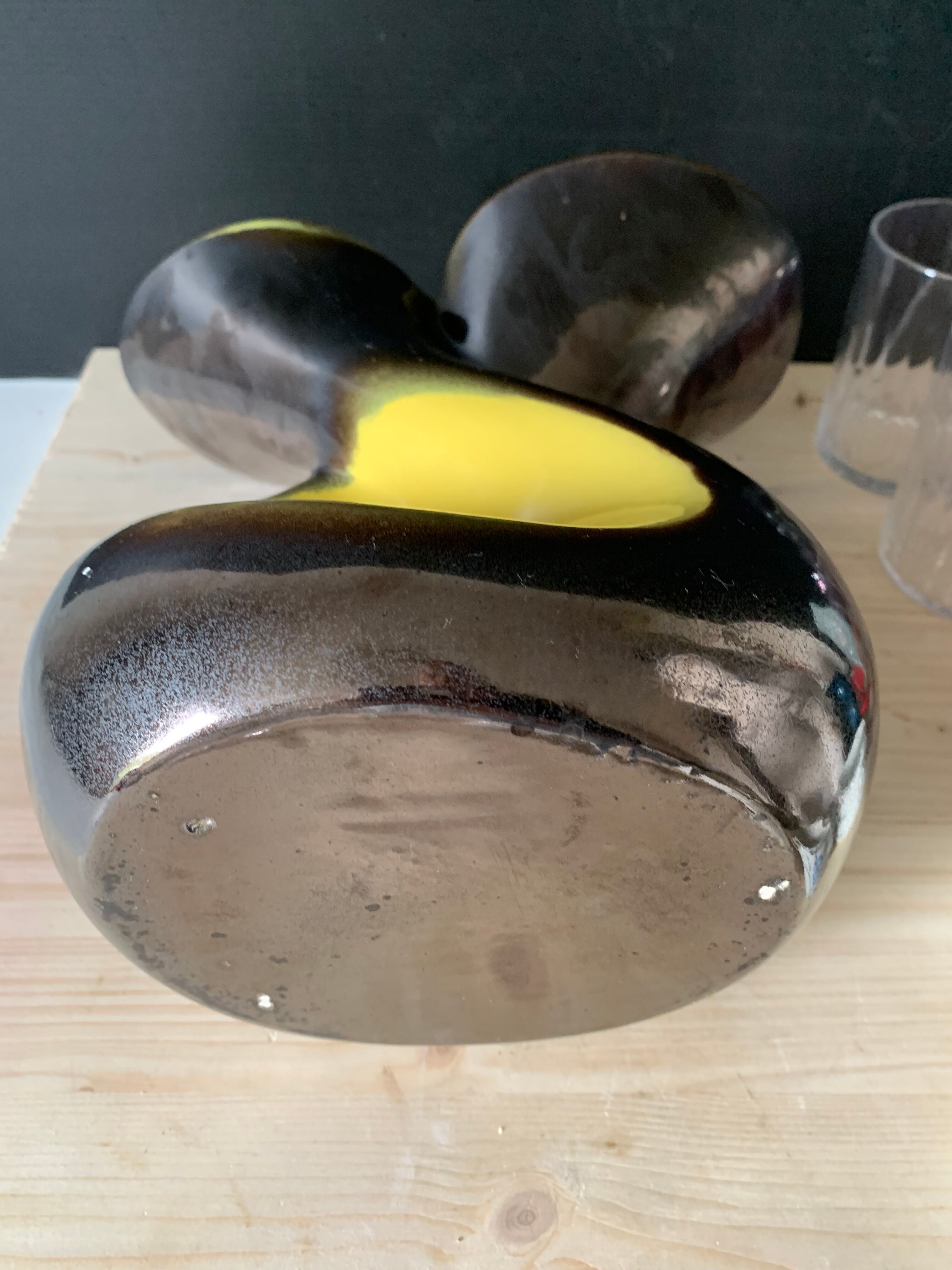 Large yellow and black vase