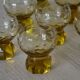 9 small amber art deco glasses