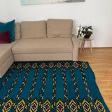 Romanian handwoven carpet with blue ground and yellow details