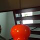 1970 orange opaline and brass pendant light