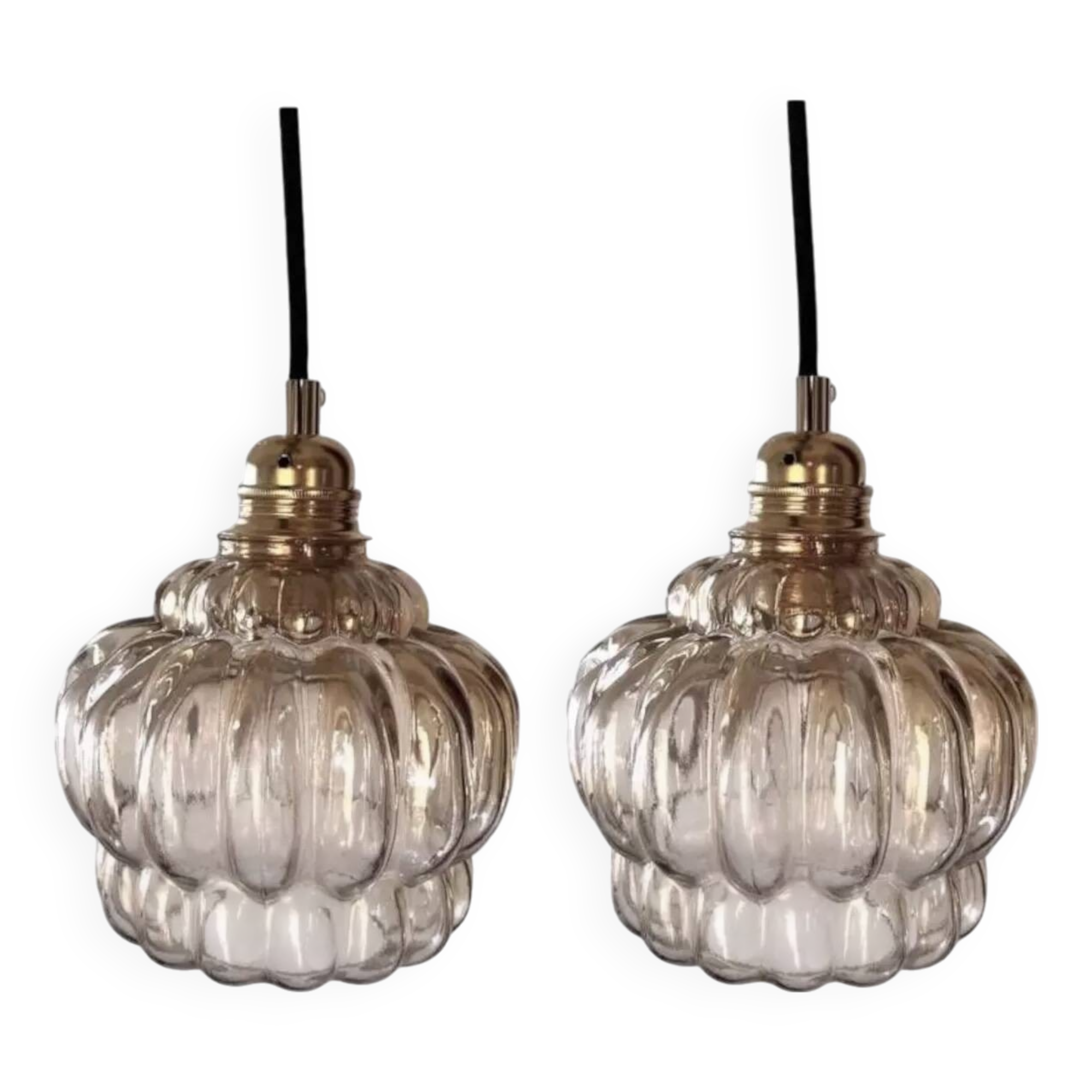 Set of two amber glass pendant lights