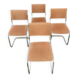 Set of 4 vintage sled chairs from the 1970s
