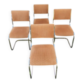 Set of 4 vintage sled chairs from the 1970s