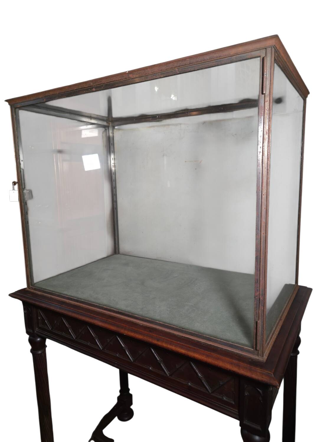 Antique display cabinet in 19th-century Gothic Revival style.