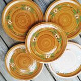 Set of glazed ceramic plates