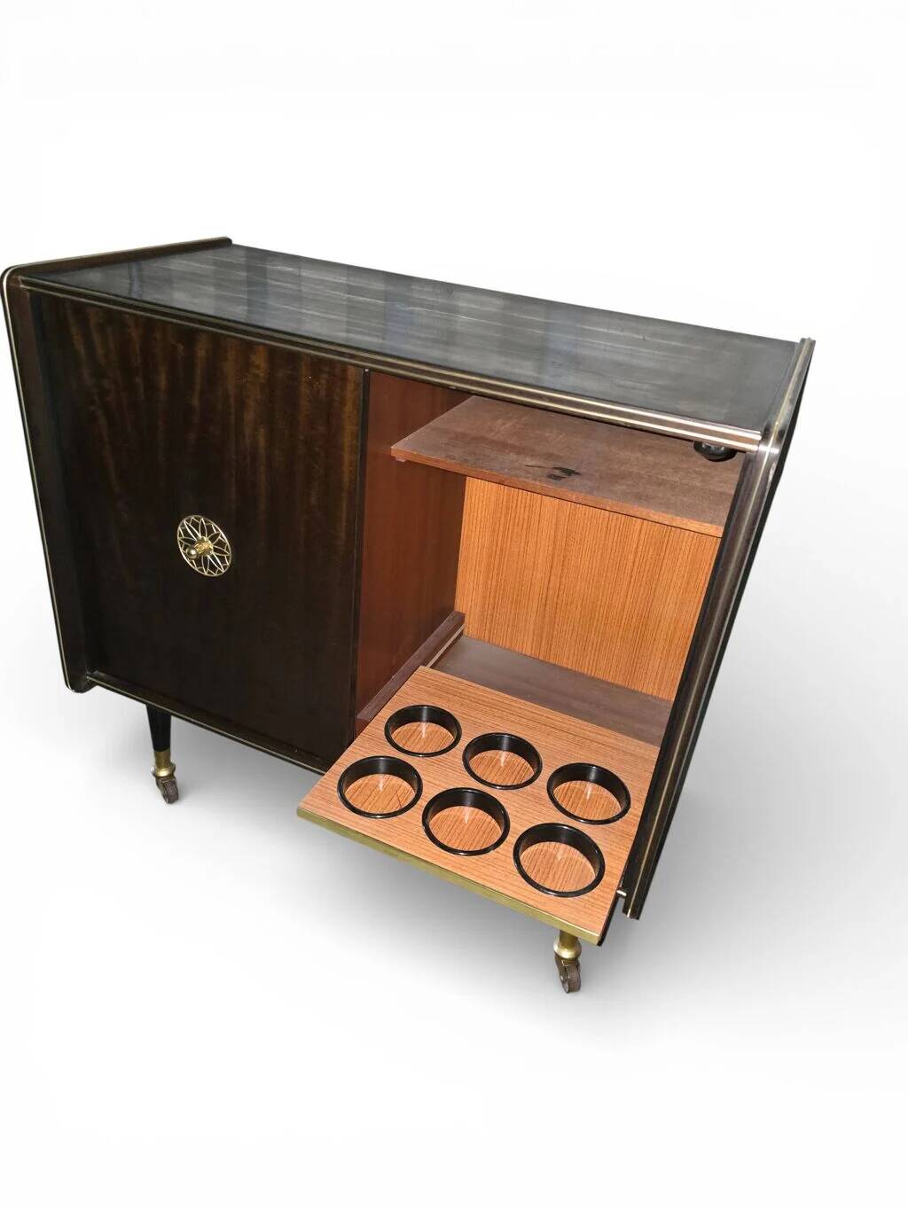 Vintage 50s-60s bar cabinet with tufted upholstery and lighting.