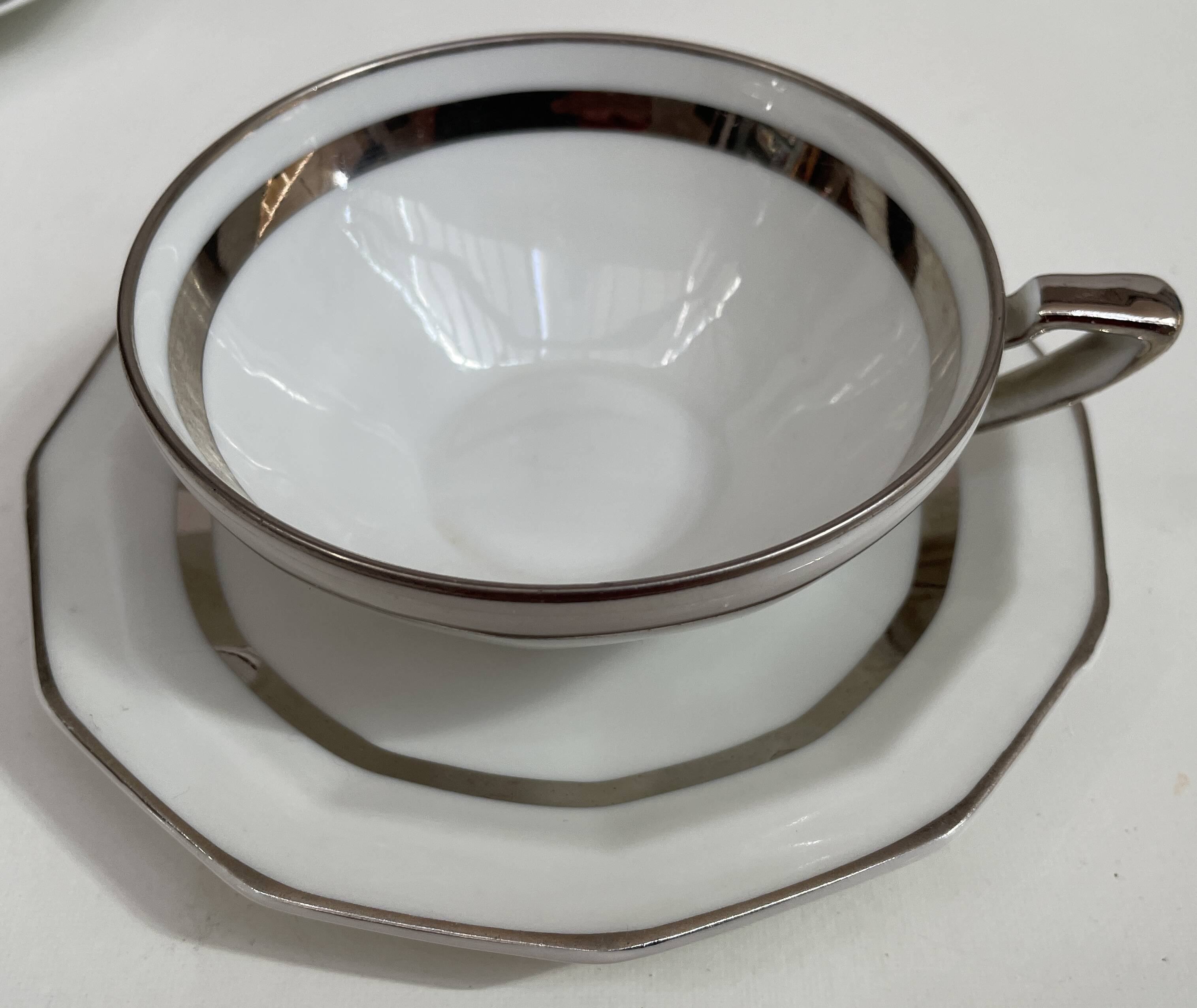 Art Deco service, porcelain with platinum, Kintsugi restoration.