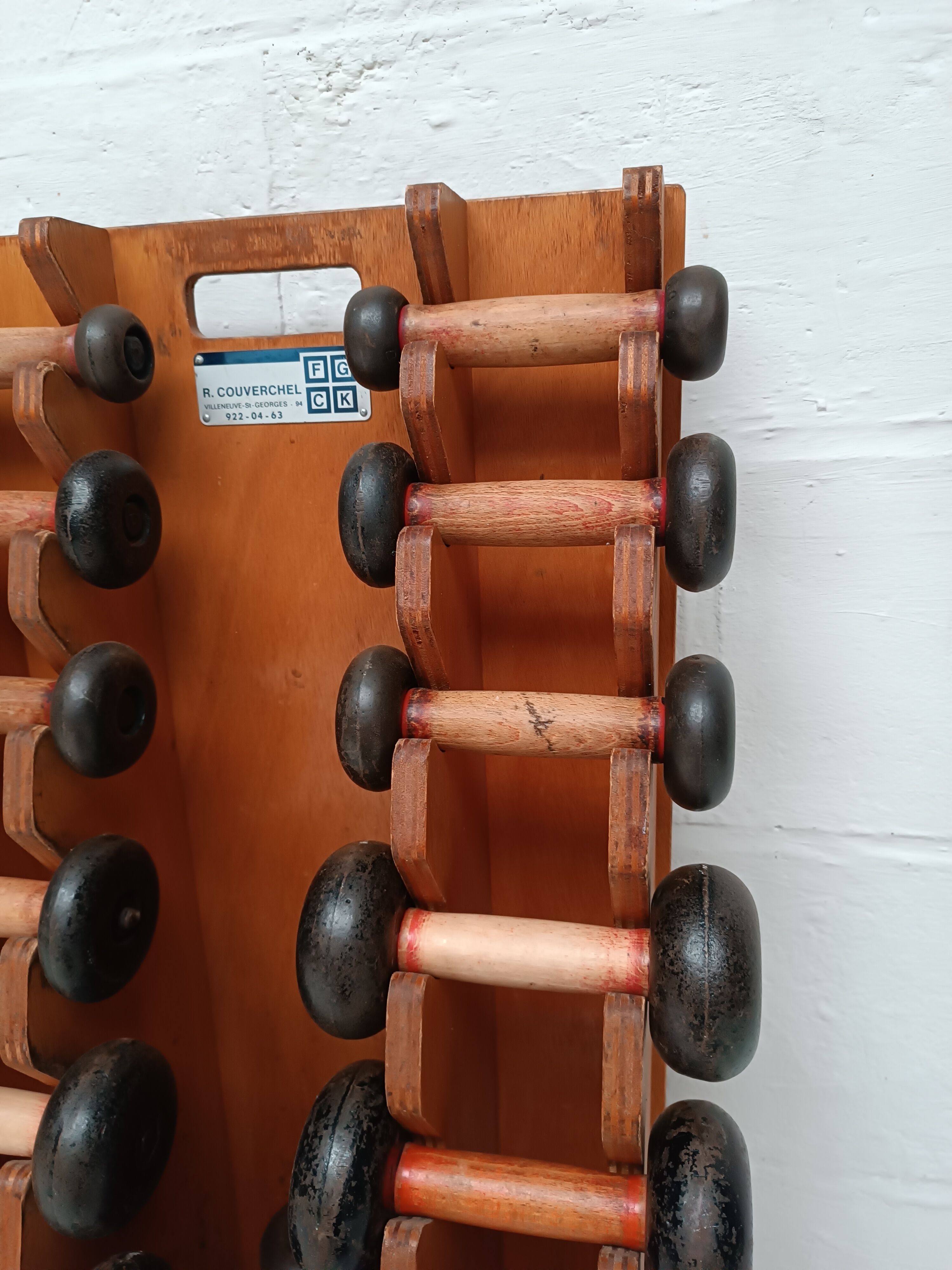 60s dumbbell wall display